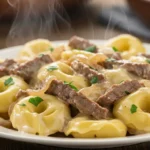 cheesesteak tortellini in rich provolone sauce